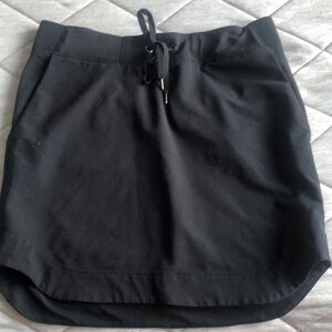 Athleta Black Drawstring Skirt ,Size S. Semi -fitted ,Mid rise ,UPF 50 , Pockets